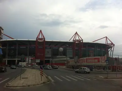 a large stadium with a soccer ball inside of it at Apartments in Pereas in an ideal location in Piraeus