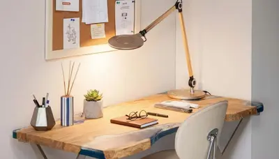 a wooden desk with a lamp and a chair at Premium 2 Bd Blue Retreat in Kallithea in Athens