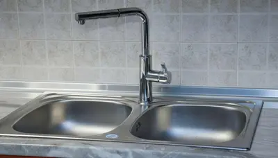 a stainless steel sink with a faucet in a kitchen at Premium 2 Bd Blue Retreat in Kallithea in Athens