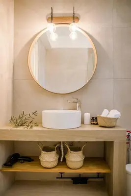 a bathroom with a sink and a mirror at Athens Riviera Villa overlooking the Aegean sea in Anavissos