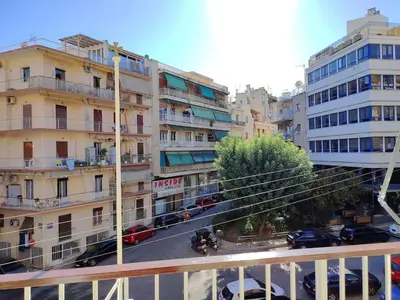 a view from a balcony of a city with buildings at Feels like home in Athens center in Athens