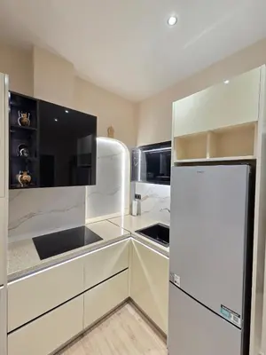 a kitchen with a white refrigerator in a kitchen at 3siblings Β2 in Athens