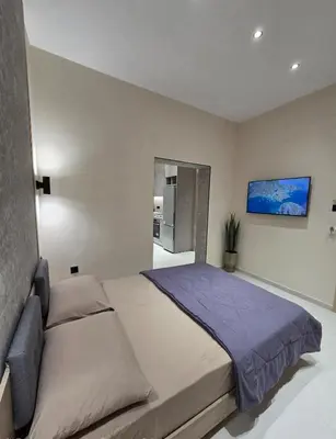 a bedroom with a large bed in a room at 3siblings A1 in Athens