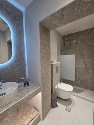 a bathroom with a sink and a toilet at 3siblings A1 in Athens
