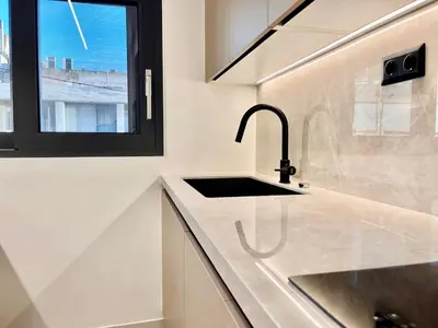a kitchen with a sink and a window at Athenian Riviera Hideaway, 1 BR in Glyfada in Athens