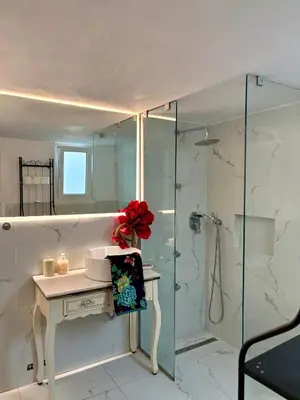 a bathroom with a sink and a shower at Dreaming of Greece G2 in Athens