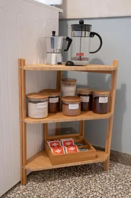 a shelf filled with food items and a blender at 2 KING beds, 81 sqm, Downtown near Metro in Athens