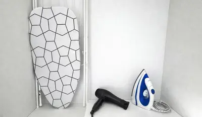 a white surfboard sitting on top of a counter at Athens View Studio Near Lycabettus Hill by MPS in Athens