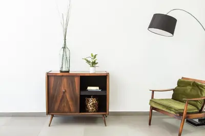 a living room with a table and a chair at Concierge Monastiraki in Athens
