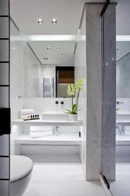 a bathroom with a sink and a toilet and a mirror at MET34 Athens in Athens