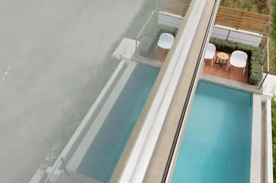 an aerial view of a swimming pool on a house at Joy Villa Agia Marina in Aghia Marina