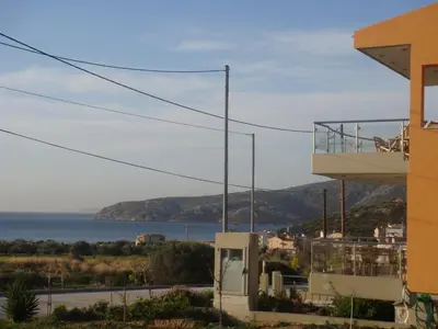 a view of the ocean from a house at Sandra's Sea View at Sounio in Sounio