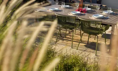 a table and chairs sitting on top of a patio at KARYATIS LUXURY MAISONETTE by K&K in Athens