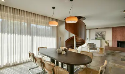 a dining room with a table and chairs at KARYATIS LUXURY MAISONETTE by K&K in Athens