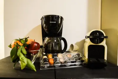 a blender sitting on top of a counter with eggs at 5inAthens in Athens
