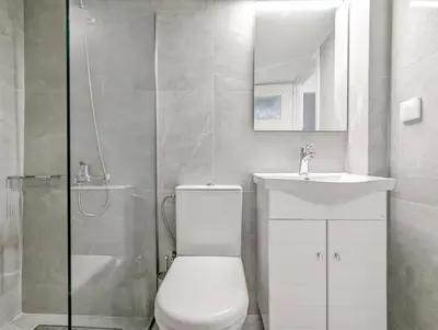 a bathroom with a toilet and a sink and a shower at Acropolis View Dream Apartments in Athens