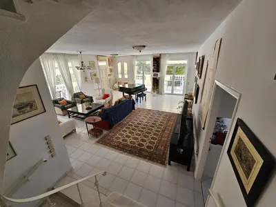 an aerial view of a living room with a piano at Villa Emily in Lagonissi
