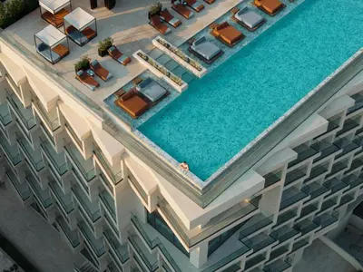 an aerial view of a hotel pool with tables and chairs at Grand Hyatt Athens in Athens