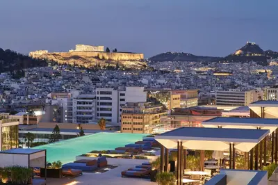 a view of a city with a swimming pool at Grand Hyatt Athens in Athens