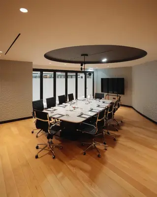 a large conference room with a long table and chairs at Grand Hyatt Athens in Athens