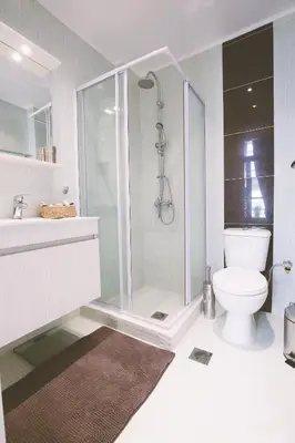 a bathroom with a shower and a toilet at Central Apartments in Psiri - Athens in Athens