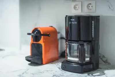 a coffee maker sitting on top of a counter at New Relaxed Central Apartment Walk Everywhere in Athens
