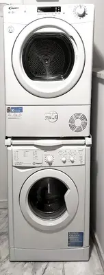 two washing machines stacked on top of each other at Allure Athens Urban Suites in Athens