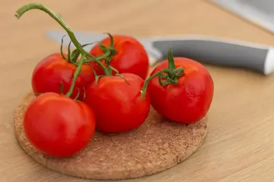 a group of tomatoes on top of a piece of bread at Amazing Penthouses with Acropolis View in Athens