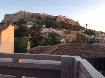 a view of a city with a mountain in the background at Best Views of Athens in Athens
