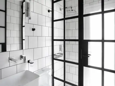 a bathroom with a sink and a mirror at Athens View Loft - 05 in Athens