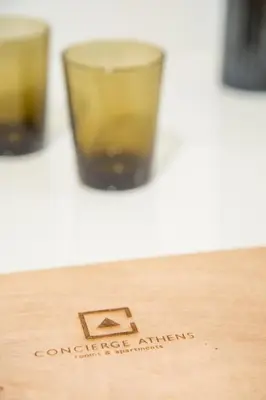 a close up of two cups on a table at Concierge Downtown in Athens