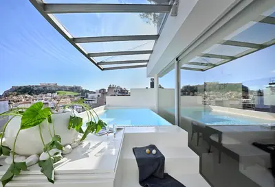 a swimming pool on the roof of a house at ALTO PSYRRI PENTHOUSE by K&K in Athens