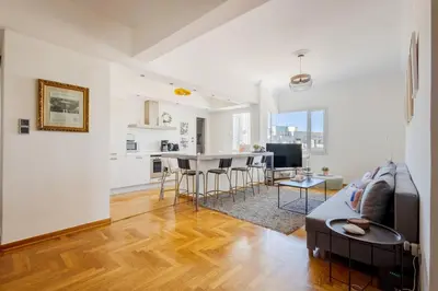 a living room with a couch and a table at 3 bdr Apt Incredible Acropolis View in Athens