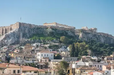 a view of a city with a mountain in the background at 3 bdr Apt Incredible Acropolis View in Athens