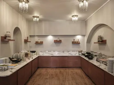 a large room with aasteryasteryasteryasteryasteryasteryasteryasteryasteryasteryastery at Candia Hotel in Athens