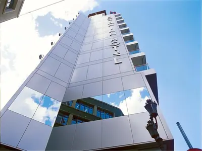 a building with a lot of windows on it at Dorian Inn - Sure Hotel Collection by Best Western in Athens