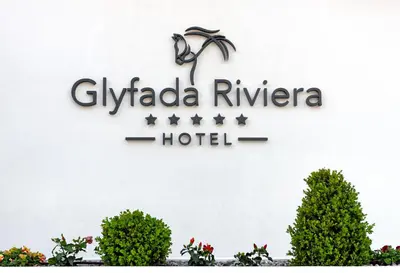 a sign for a hotel at a hotel at Glyfada Riviera Hotel in Athens