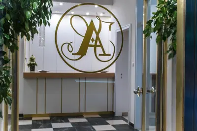 a sign on the front door of a store at Ares Athens Hotel in Athens