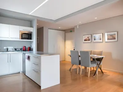 a kitchen and dining room with a table and chairs at Central Athens Loft in Athens