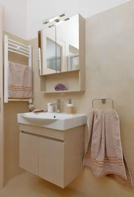 a bathroom with a sink and a mirror at Oro's Stylish Kolonaki Flats Next to Metro & Museums in Athens