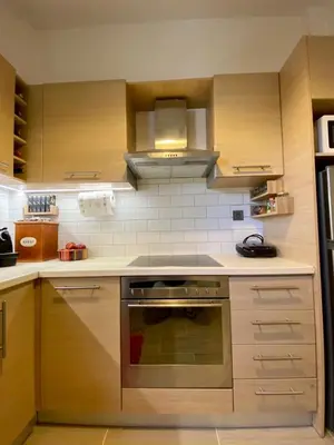 a kitchen with a stove top oven in a kitchen at Plato's Academy Home in Athens