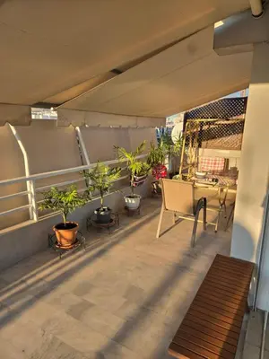 a balcony with a bunch of potted plants on it at Top Floor Studio Near Metro&View&200mbps in Athens