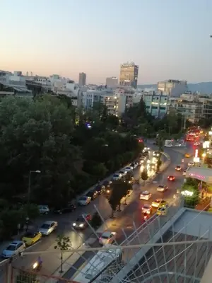a city street filled with lots of traffic at night at Top Floor Studio Near Metro&View&200mbps in Athens
