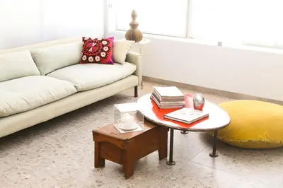 a living room with a couch and a coffee table at ApArt Suite in Athens