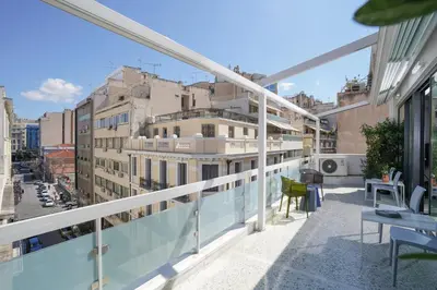 a balcony with a view of a city at ApArt Suite in Athens