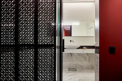 a bathroom with a shower with a glass door at The Zillers Boutique Hotel in Athens