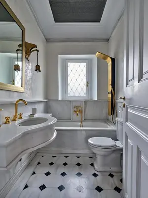 a bathroom with a tub and a toilet and a sink at The White House in Plaka by JJ Hospitality in Athens