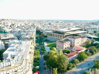 an aerial view of a city with buildings at Star Acropolis Apartment in Athens
