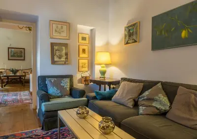 a living room with a couch and a table at Acropolis Villa in Plaka in Athens