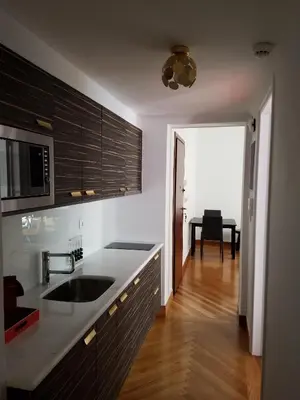 a kitchen with a sink and a counter top at Lux Kolonaki Apartment in Athens
